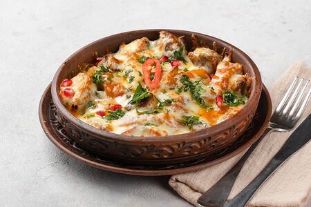 Оджахури со свининой, запеченное под сыром