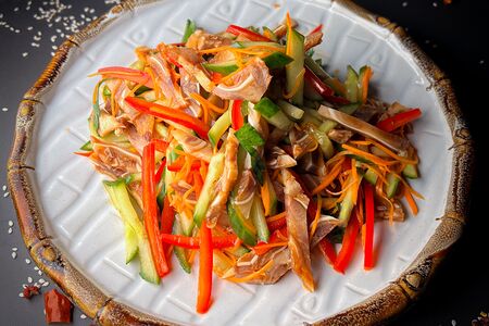 Салат из огурцов со свиными ушами