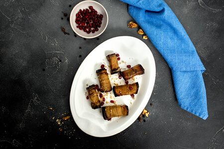 Рулетики из баклажанов с ореховой начинкой