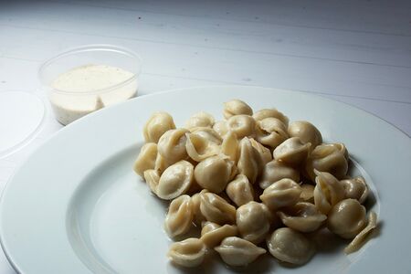 Дюшбара с соусом тузлук