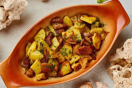 Картофель жареный с белыми грибами