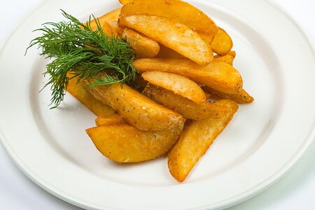 Запечённые ароматные картофельные дольки