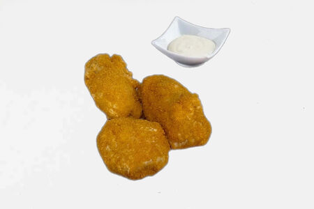 Куриные наггетсы с белым соусом