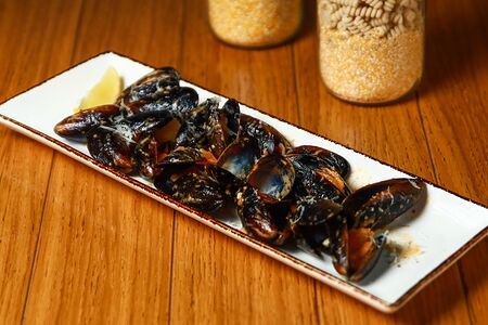 Мидии в соусе том ям