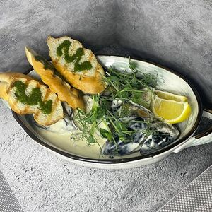 Мидии в соусе дорблю