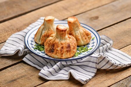 Жареные хинкали с сыром и зеленью 