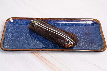 Эклер шоколадный