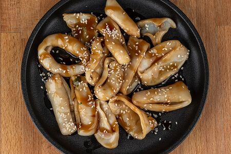 Кальмар в терияки с кунжутом