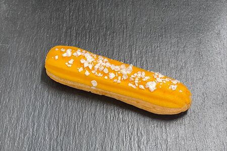 Эклер Апельсиновый крем-чиз