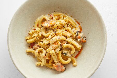 Сливочно-томатная паста с мидиями и кальмарами