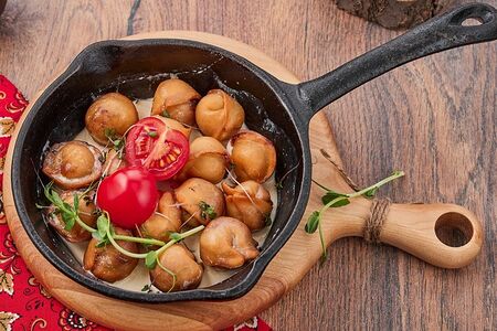 Пельмени, жаренные в сливочном соусе