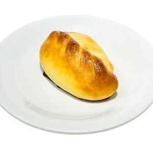 Печеный пирожок с капустой