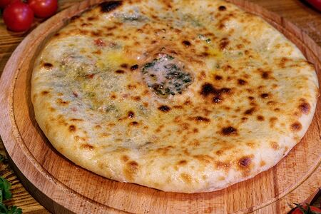 Осетинский пирог с сыром и зеленью 