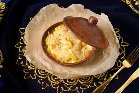 Сёмга, запечённая с картофелем и сыром