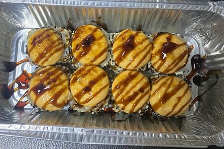 Ролл Запеченный в кунжуте с угрём под сырным соусом