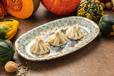 Хинкали с тыквой и лососем 3 штуки