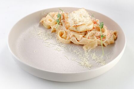 С филе зубатки и томатами 