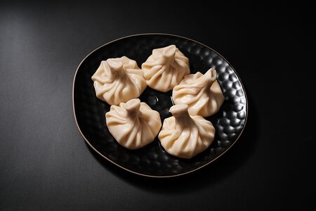 Хинкали с бараниной и эстрагоном 