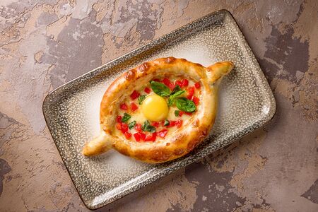 Хачапури Аджарули со сладким помидором и базиликом