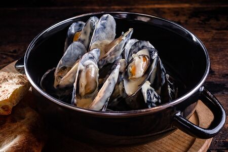 Мидии в сливочном соусе