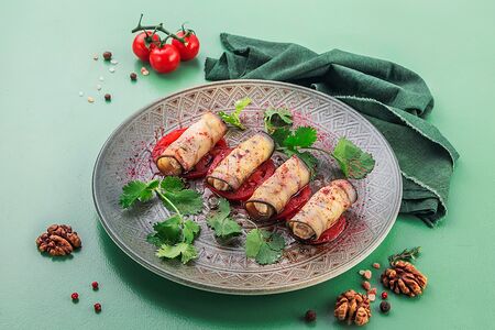 Рулетики из баклажана с томатами