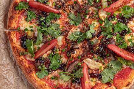 Пицца c мраморной говядиной и артишоками