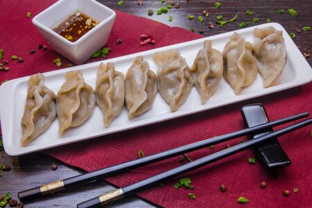 Пельмени со свининой и капустой