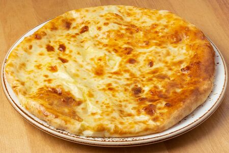 Осетинский пирог с сыром и зеленью