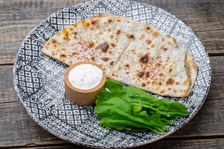 Лепешка с сыром на огне