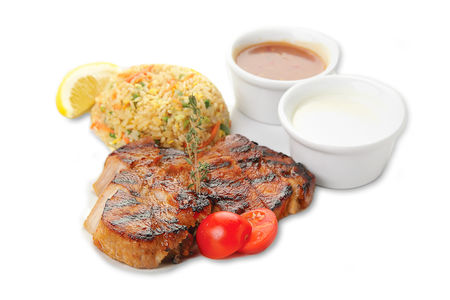 Стейк из свинины, приготовленный на гриле