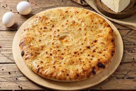 Осетинский пирог с сёмгой, яйцом и сыром