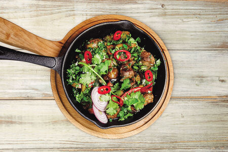 Томленная баранина с овощами