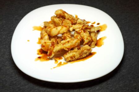 Рыба хрустящая в кисло-сладком соусе
