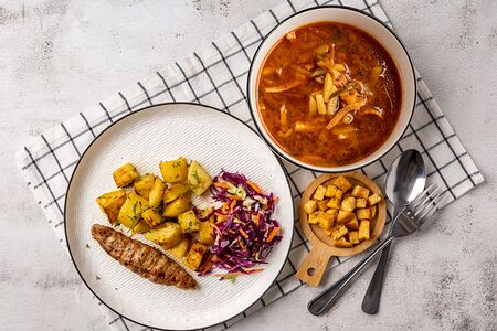 Люля-кебаб из индейки, картофель запечённый, салат и суп солянка  