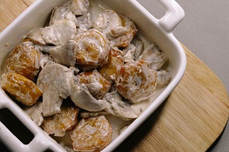 Пельмени, запеченные в сливках