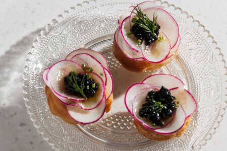 Профитроли с пате из копченой форели и икрой палтуса