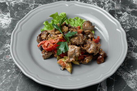 Куриные потрошки с овощами