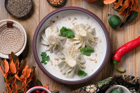 Набор из трёх хинкали №3 Грибы и Сулугуни в сливочном соусе