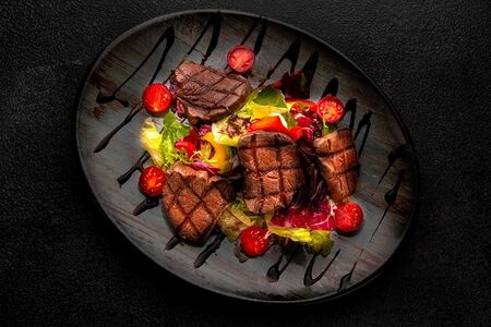 Тёплый мясной салат