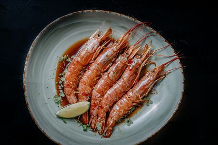 Лангустины в кисло-сладком соусе