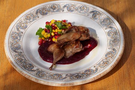 Перепелка со сладкой кукурузой и вишневым соусом ткемали