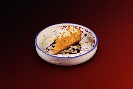 Чизкейк в карамели с соусом из чёрной смородины