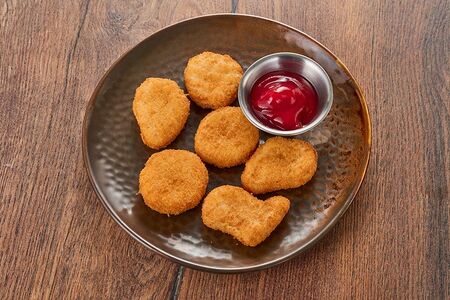Куриные нагетсы с кетчупом