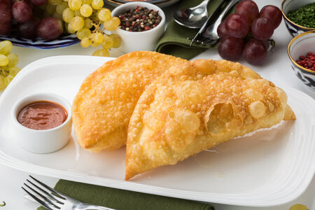 Чебурек с сыром и соусом сацебели