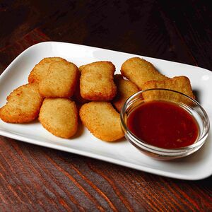 Наггетсы куриные с пряным соусом