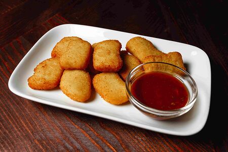 Наггетсы куриные с пряным соусом