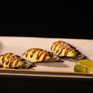 Мидии в ракушках в чесночном соусе