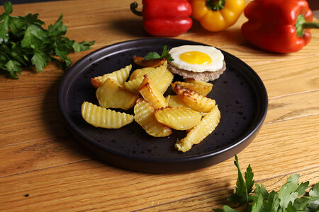 Картофель запеченный дольками