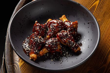 Куриные крылья в пряном соусе