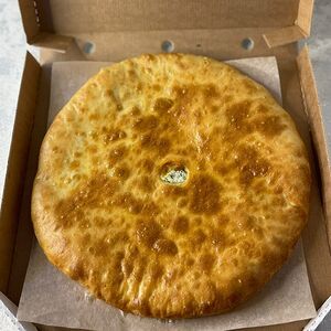 Осетинский пирог с сыром и зеленью, ботвой 